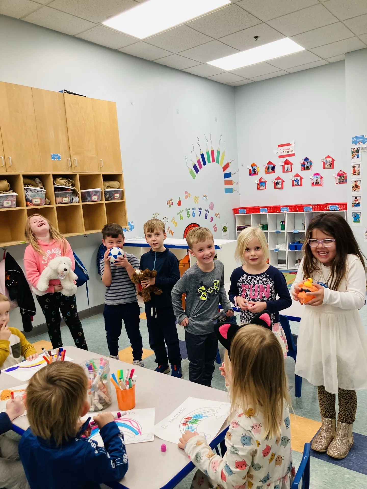 Children exploring a creative project together outside of class