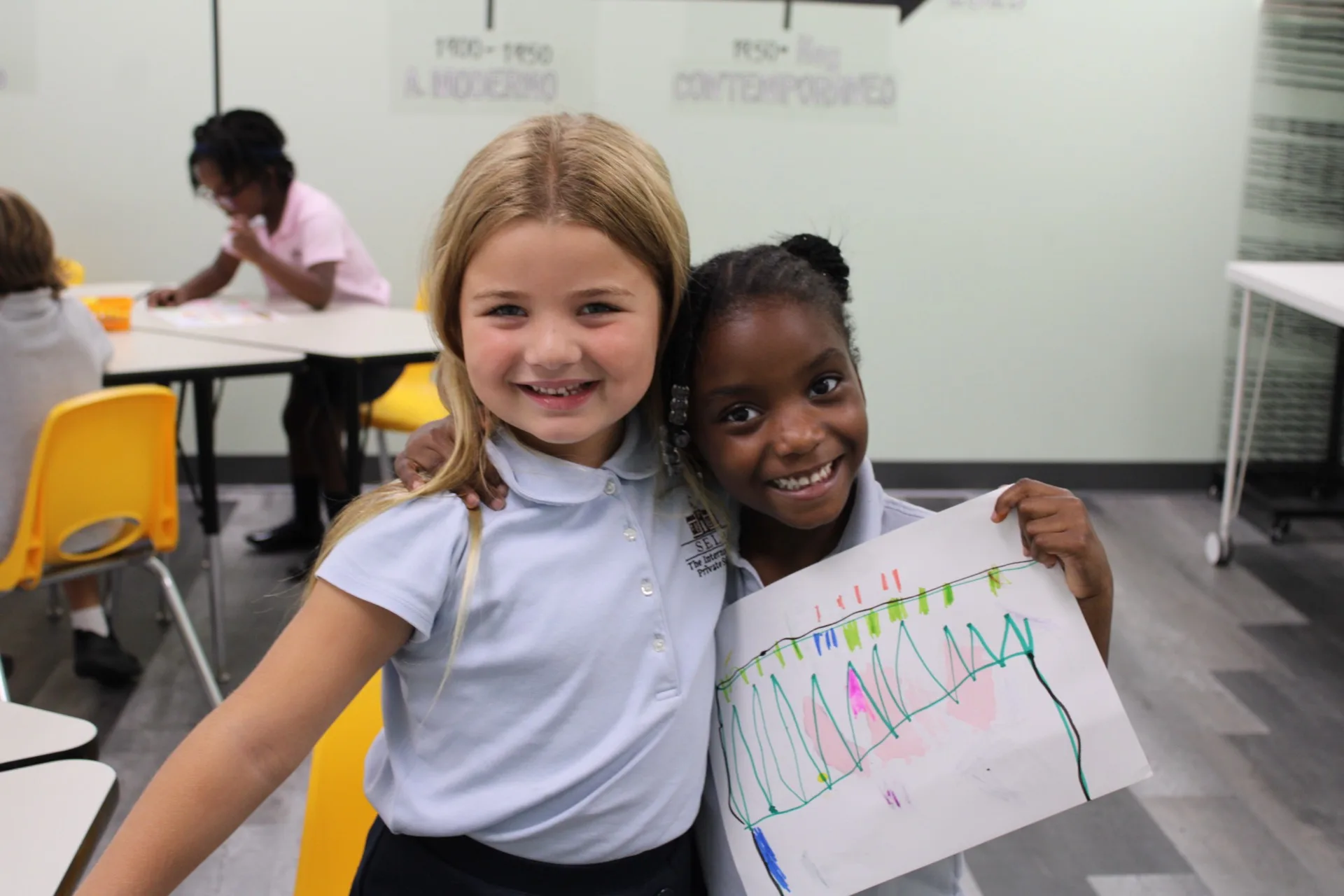 A SELA student painting during an art lesson